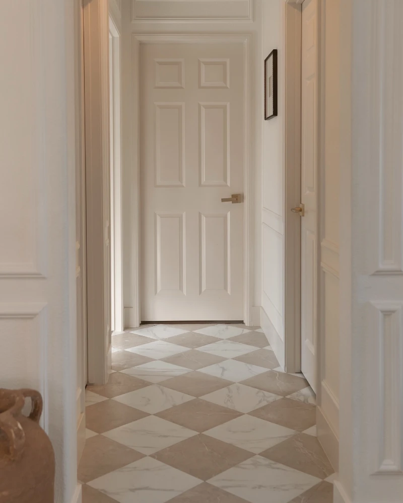 1. Taupe and White Checkerboard Hallway with Marble Veining