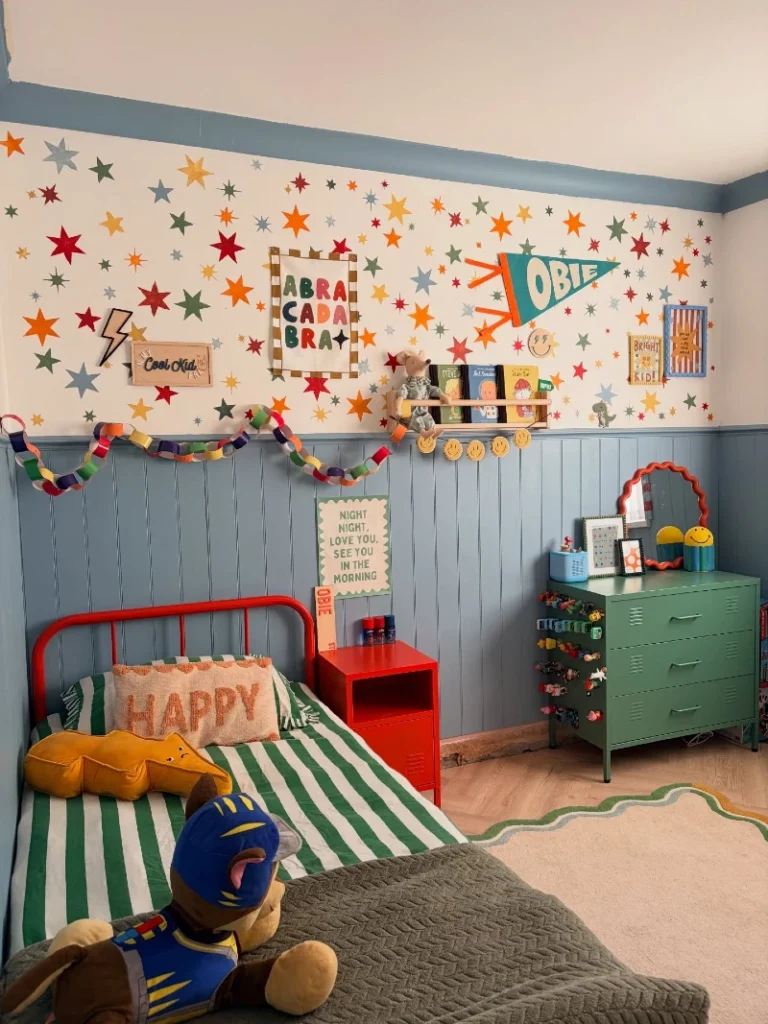 10. Star Covered Wall with Red Metal Bed and Green Locker Dresser