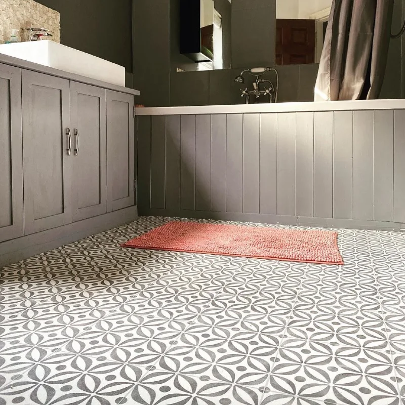 11. Gray Floral Bathroom Floor with Paneled Bath and Coral Bath Mat