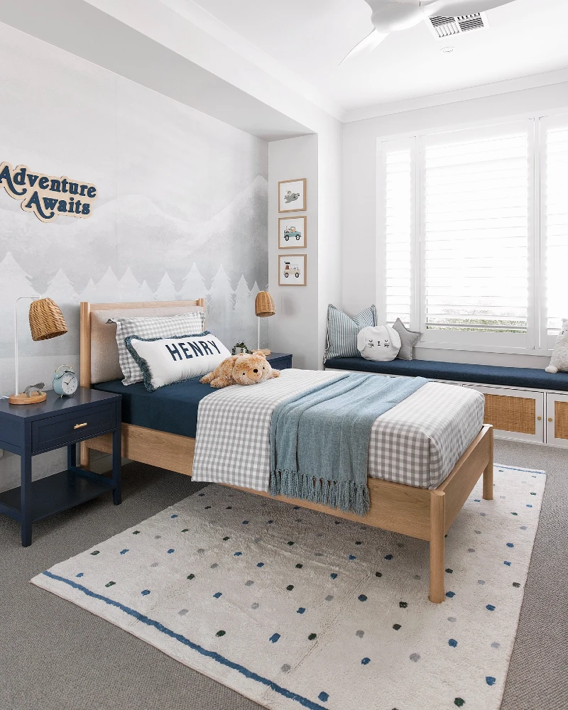 11. Soft Mountain Mural Bedroom with Navy Window Seat and Woven Lamp Shades