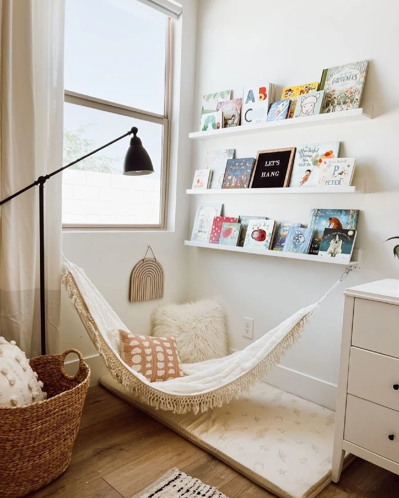 12. Fringed Hammock Reading Nook with Picture Ledges and Soft Floor Mat