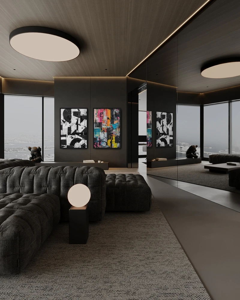 13. Charcoal Tufted Sofa with Mirror Wall and Oversized Round Ceiling Lights