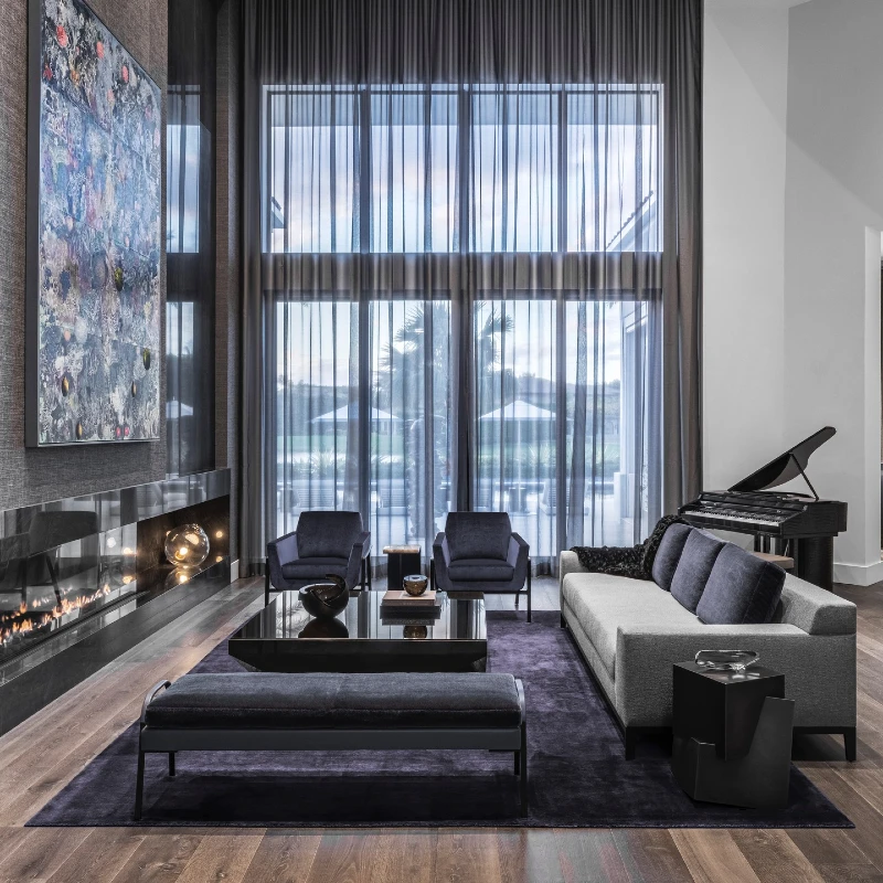 14. Double Height Living Room with Grand Piano, Sheer Curtains, and Black Glass Fireplace