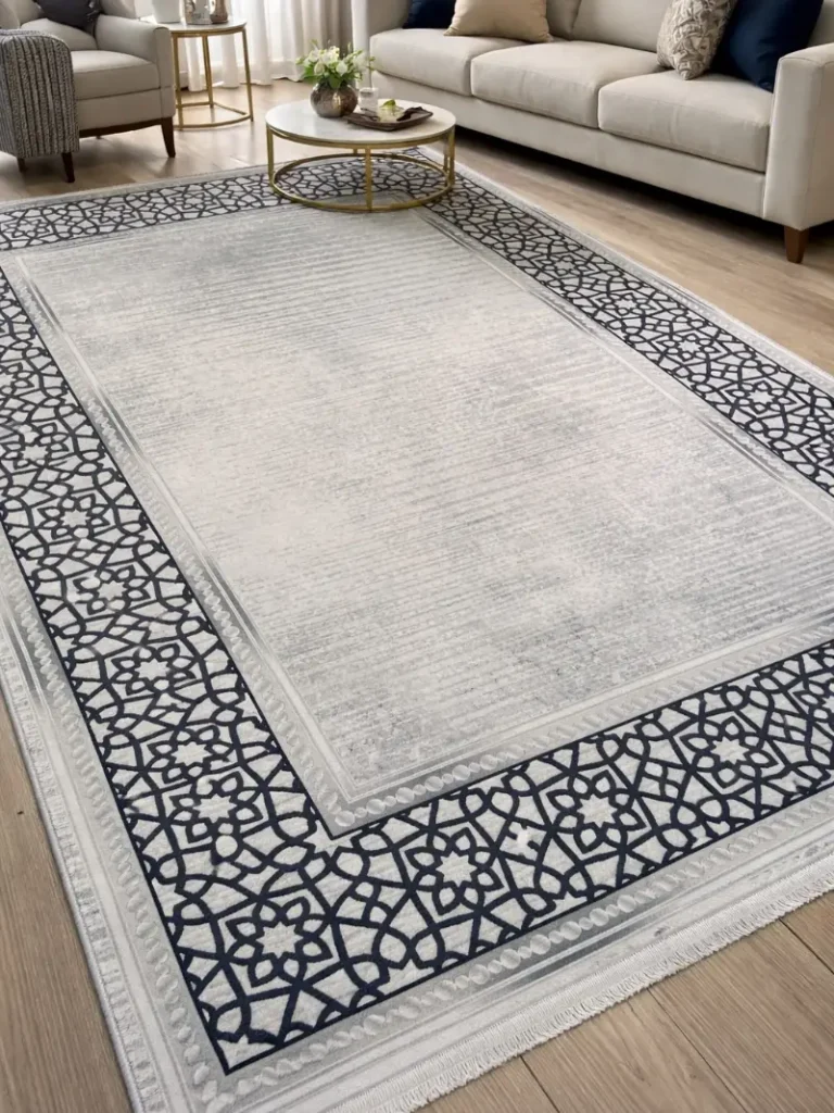 16. Light Grey Area Rug with Navy Geometric Border in Modern Living Room with Beige Sofa