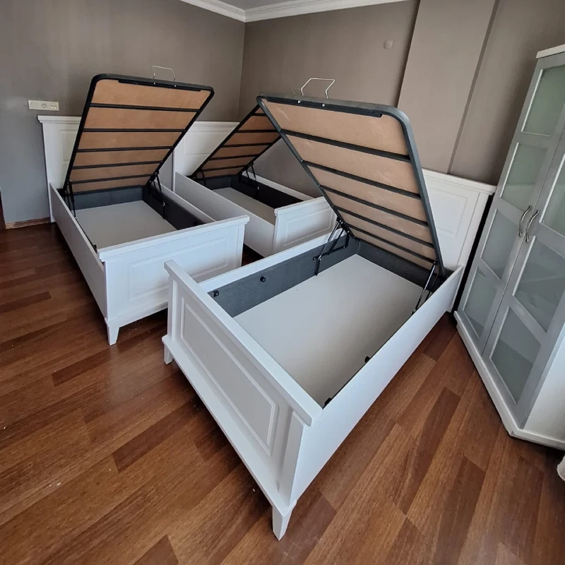 16. White Lift Up Beds with Hidden Ottoman Storage and Paneled Frames
