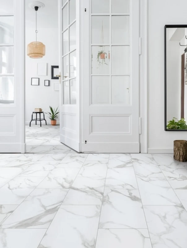 17. White Marble Look Entry Floor with Black Mirror and Woven Plant Basket