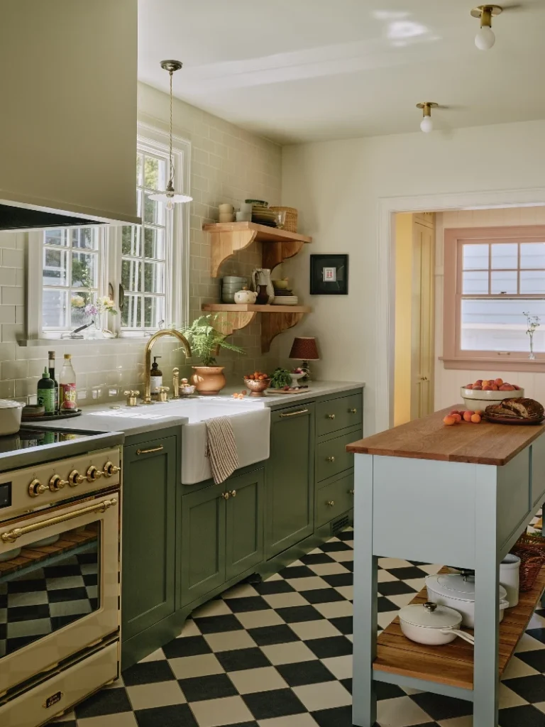 20. Olive Green Cabinets with Checkerboard Floor and Brass Range Oven Island Contrast