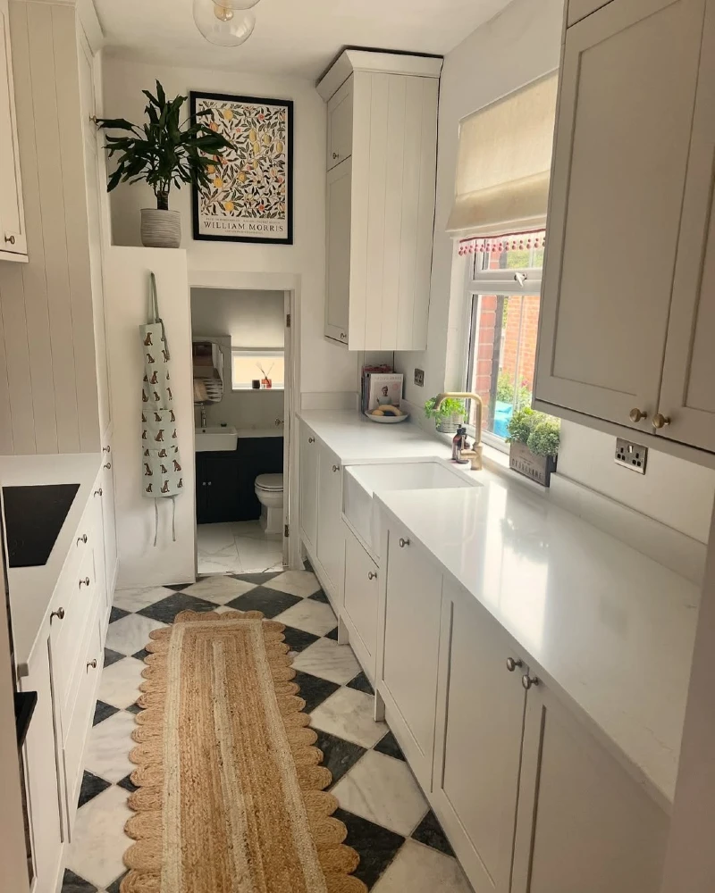 3. Cream Galley Kitchen with Checkered Marble Floor and Scalloped Jute Runner