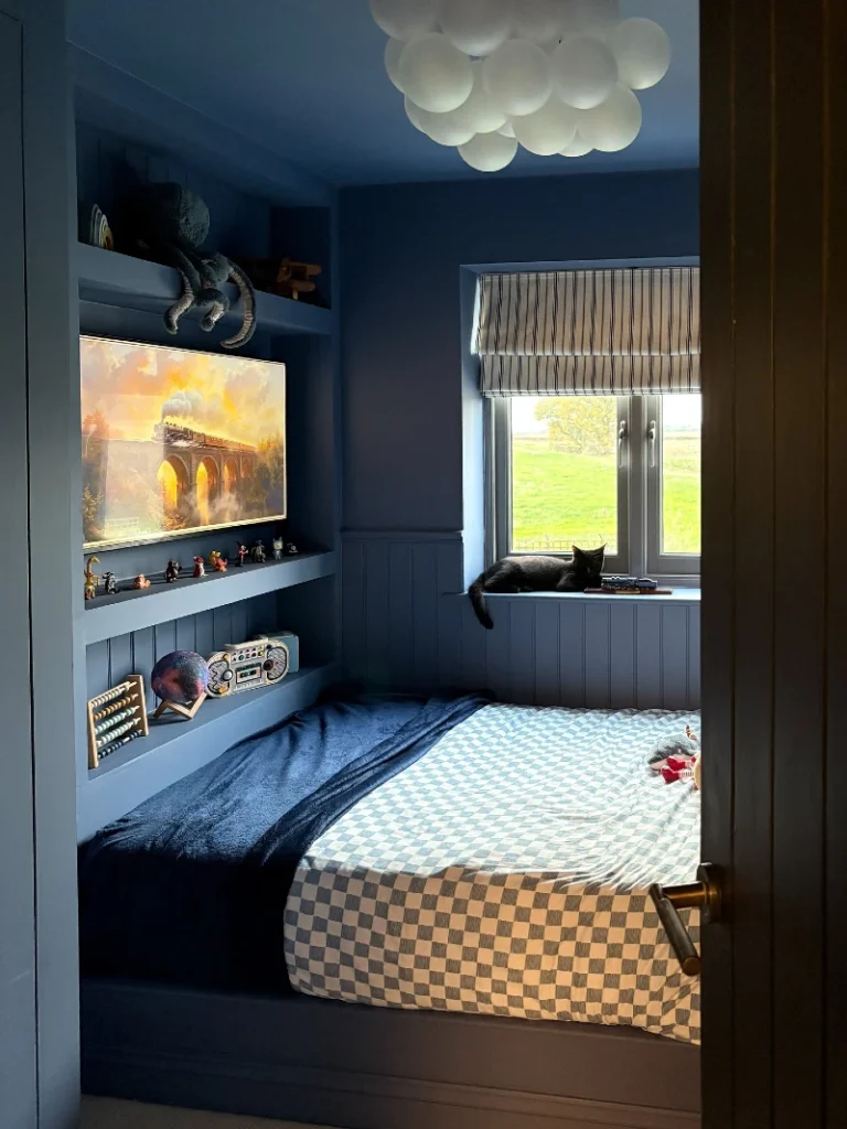 4. Blue Built In Bed Nook with Cloud Light and Checker Bedding
