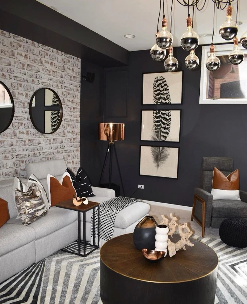 4. Whitewashed Brick Wall with Copper Lights and Feather Art