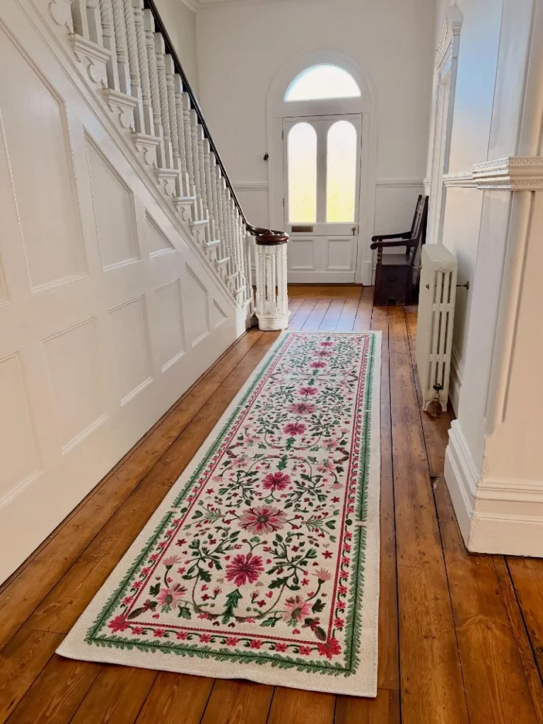 5. Floral Runner Rug in Bright Hallway with Warm Wood Flooring and Stair Detail