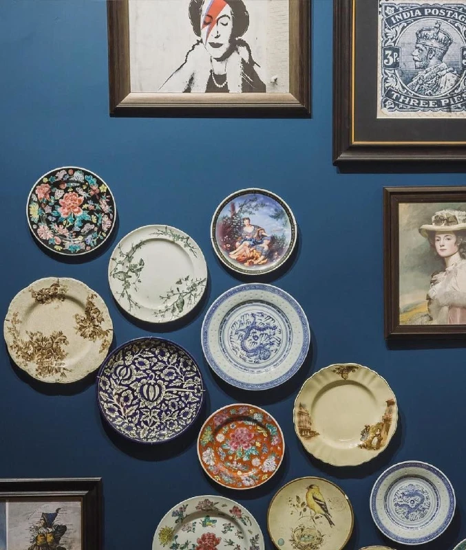 6. Deep Blue Plate Gallery Wall with Framed Portrait Art Mix