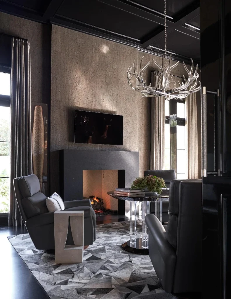 7. Black Coffered Ceiling with Silver Antler Chandelier and Stone Fireplace