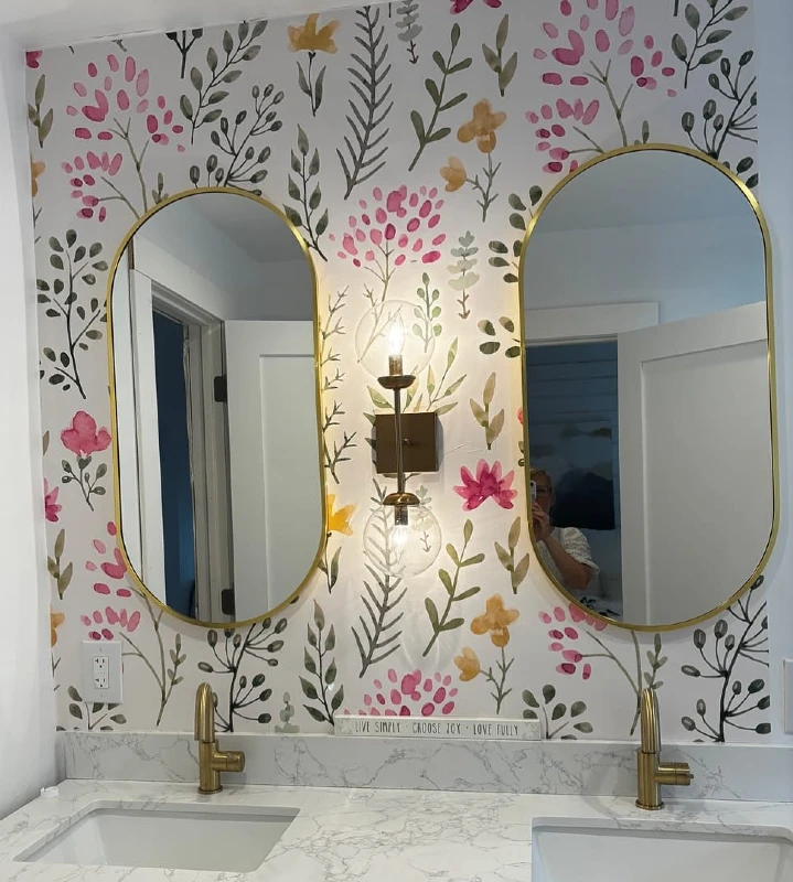 7. Dual Gold Arched Mirrors with Floral Peel and Stick Wallpaper Accent Wall