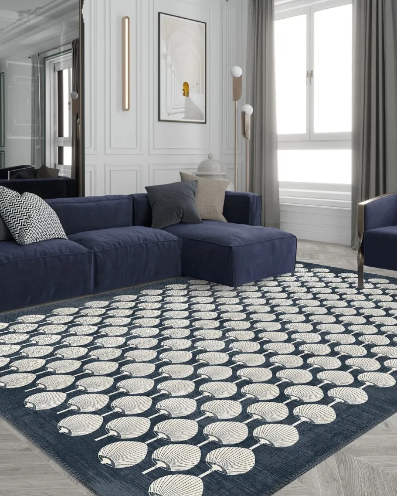 7. Navy Geometric Living Room Rug Over Grey Rental Carpet with Bold Pattern Disruption