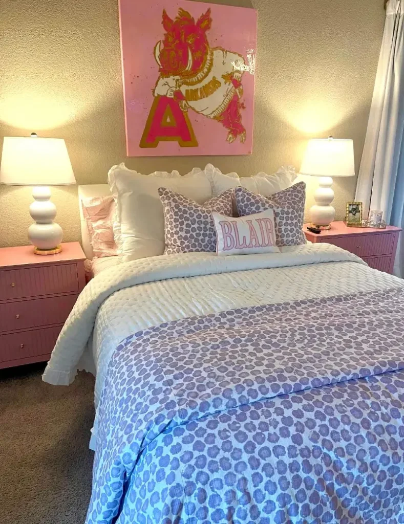 8. Pink Monogram Bed with Matching Nightstands and Mascot Wall Art