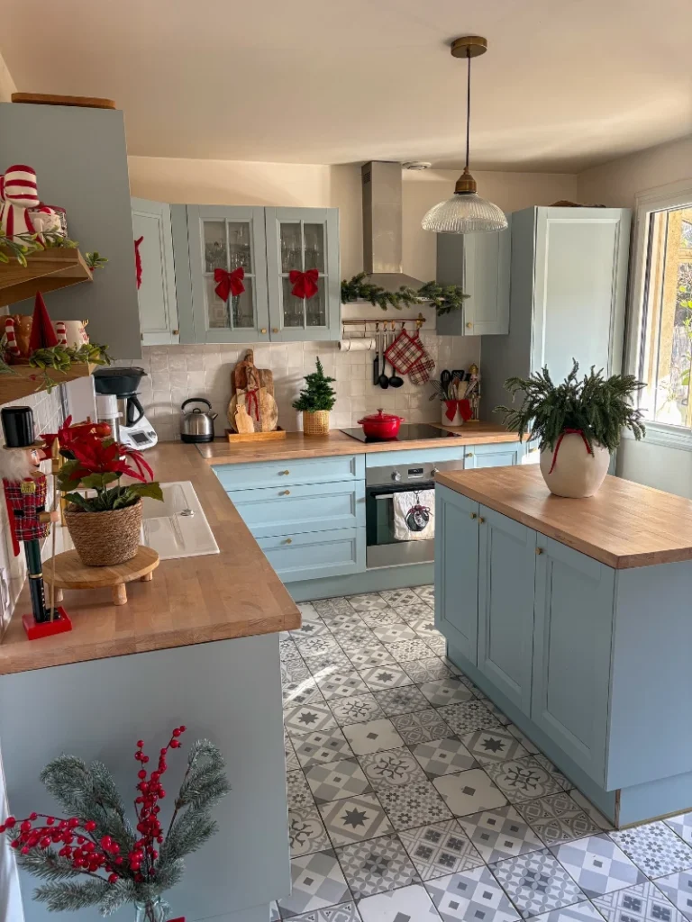 8. Powder Blue Kitchen with Red Bows, Nutcracker, and Evergreen Island Vase