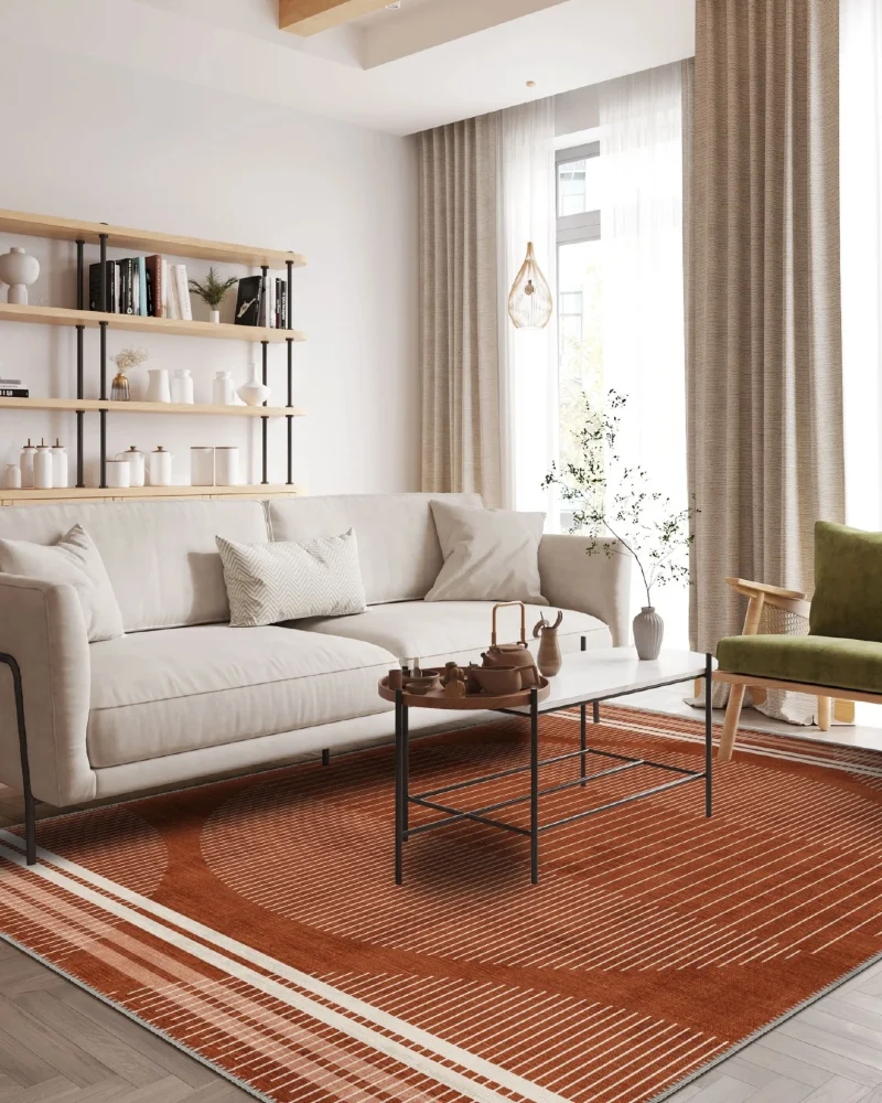8. Terracotta Geometric Living Room Rug with Neutral Sofa and Warm Wood Accents