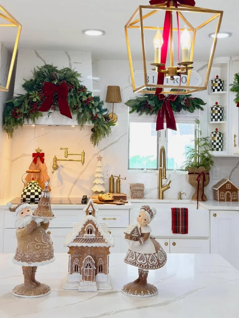 9. White Marble Kitchen with Gingerbread Figures, Gold Lanterns, and Red Bows