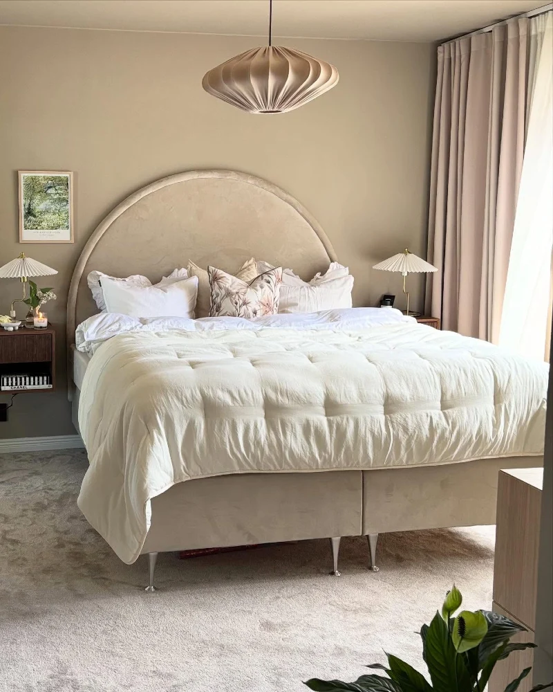Arched Upholstered Headboard with Paper Pendant and Neutral Layers