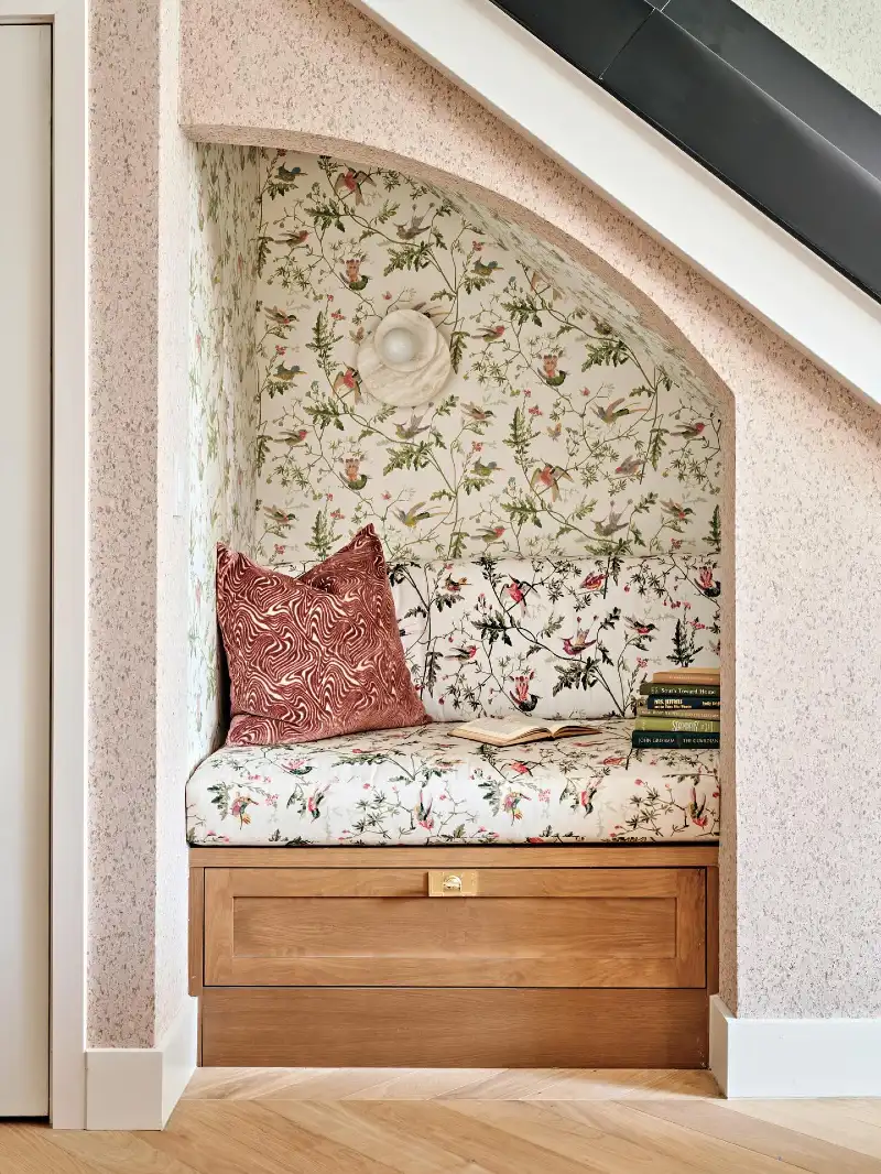 Arched Wallpapered Nook with Botanical Prints and Built-In Wood Bench