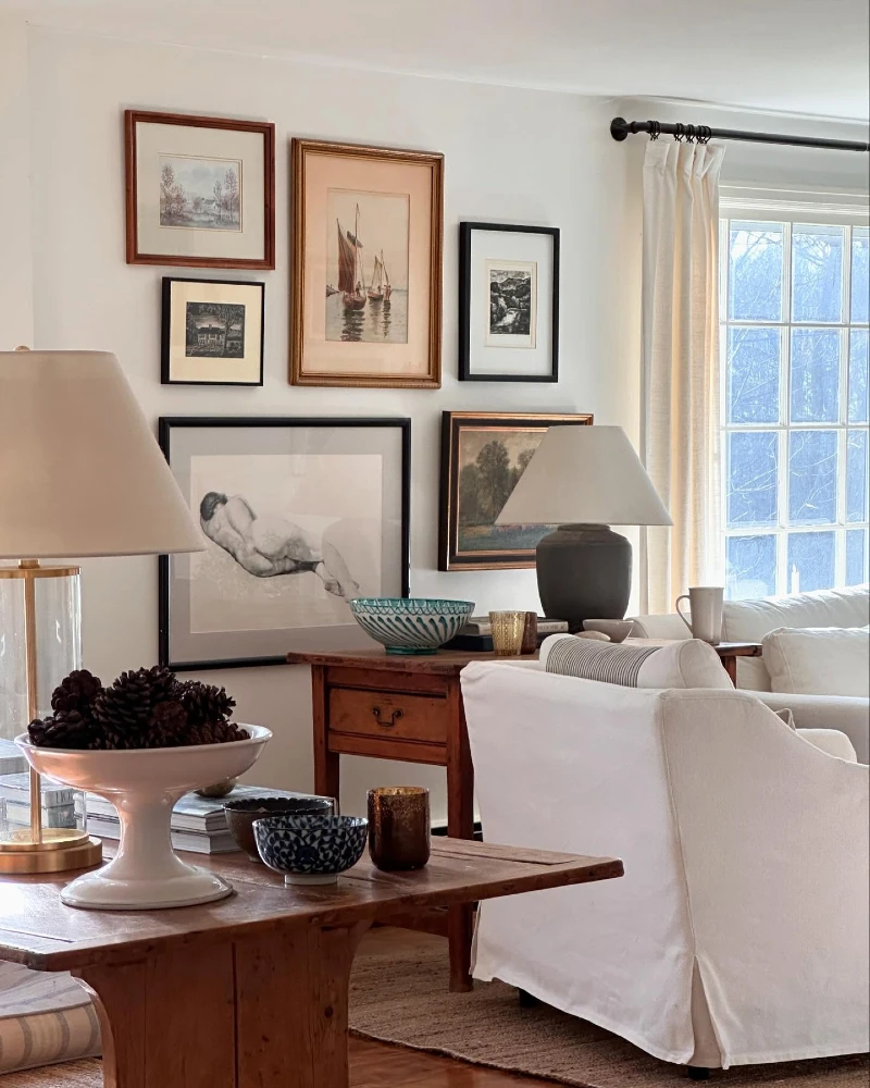 Asymmetrical Frame Cluster Beside Window with Mixed Wood and Black Borders