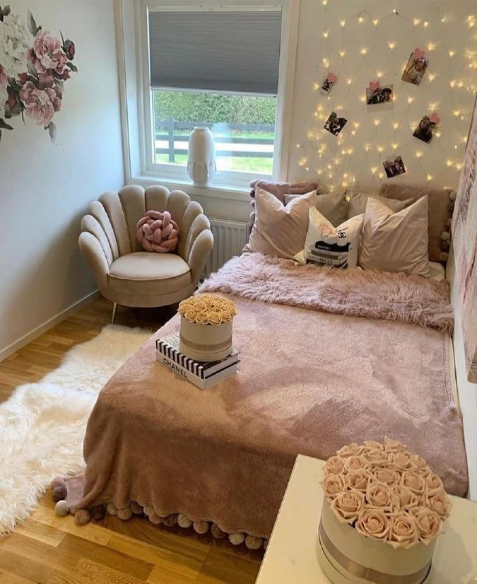Blush Bed Corner with Shell Chair and Photo String Lights