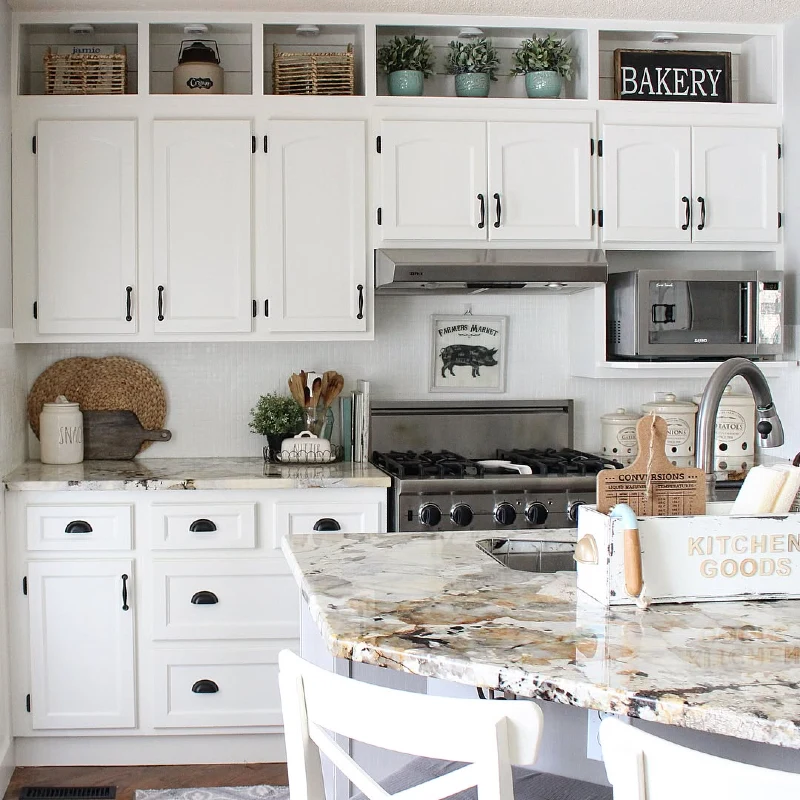 Built-In Cubbies with Faux Greenery, Wire Baskets, and Farmhouse Signage