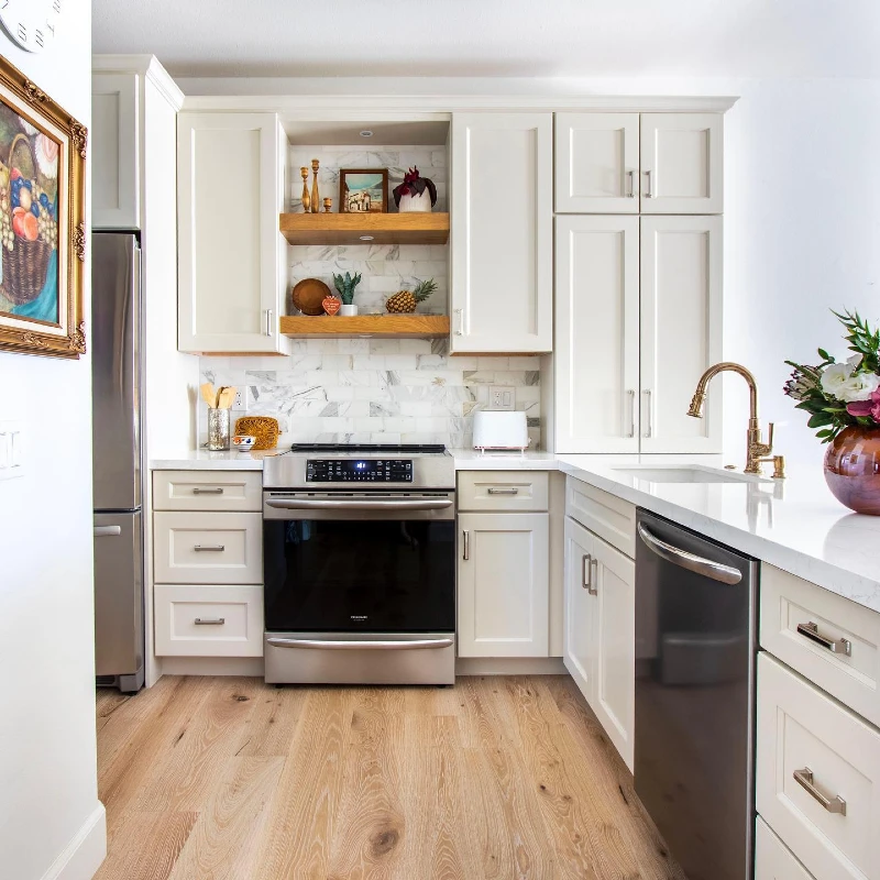 Built-In Recessed Oak Shelves with Brass Candlesticks, Framed Art, and Mini Succulents