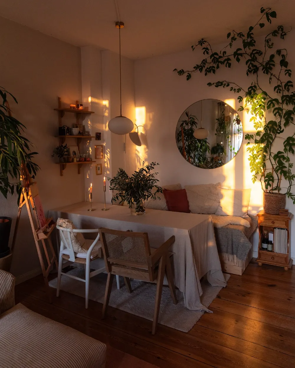 Candlelit Dining Nook with Wall Shelves and Warm Evening Glow