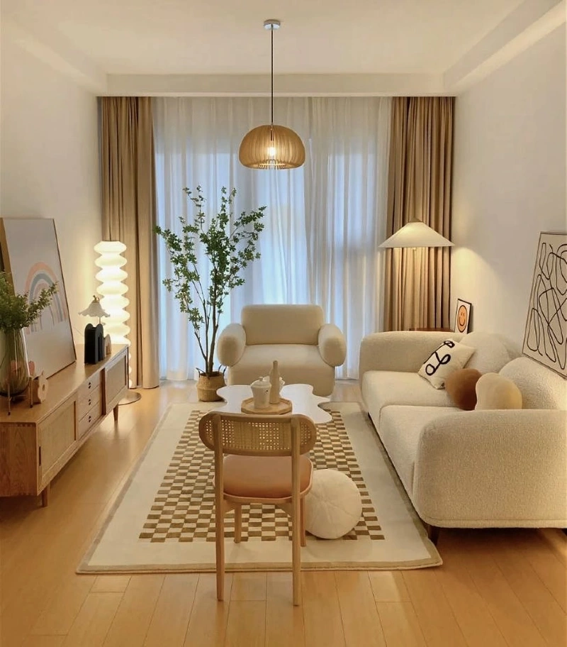Checkerboard Rug with Boucle Sofa, Cane Chair, and Warm Globe Pendant