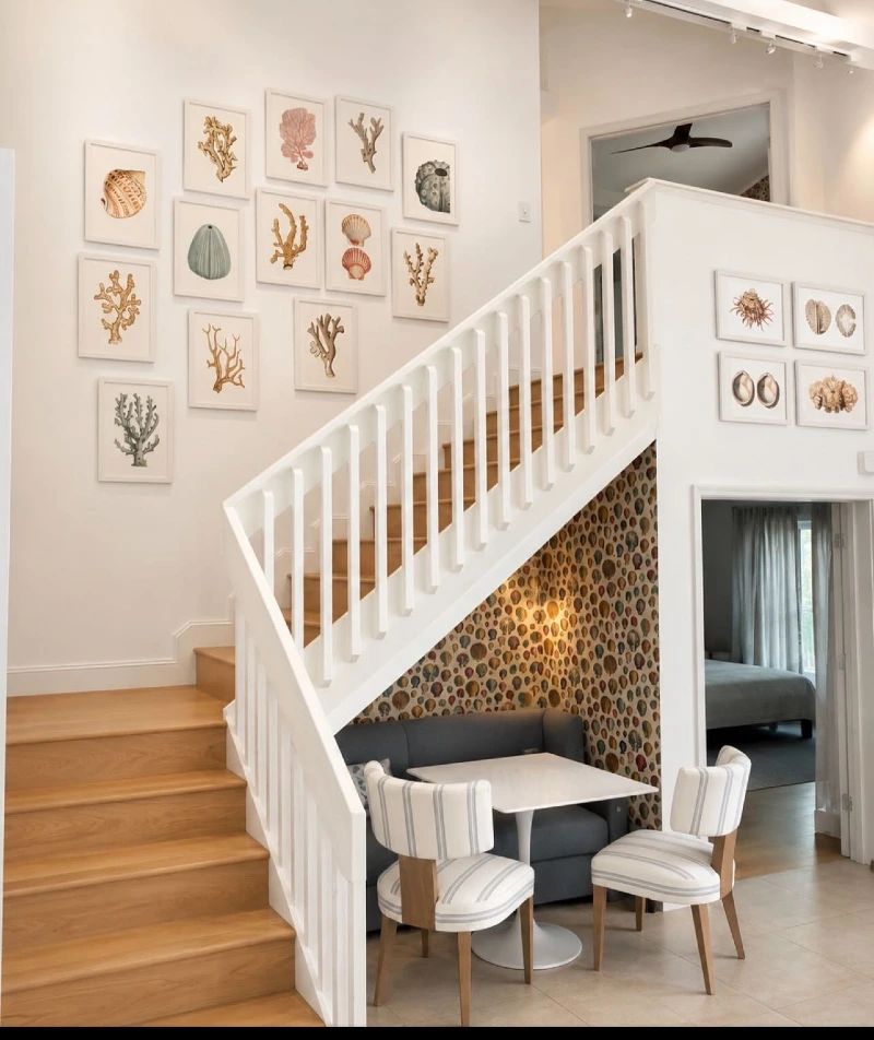 Coastal Banquette Seating with Hot Air Balloon Wallpaper and Shell Gallery Wall