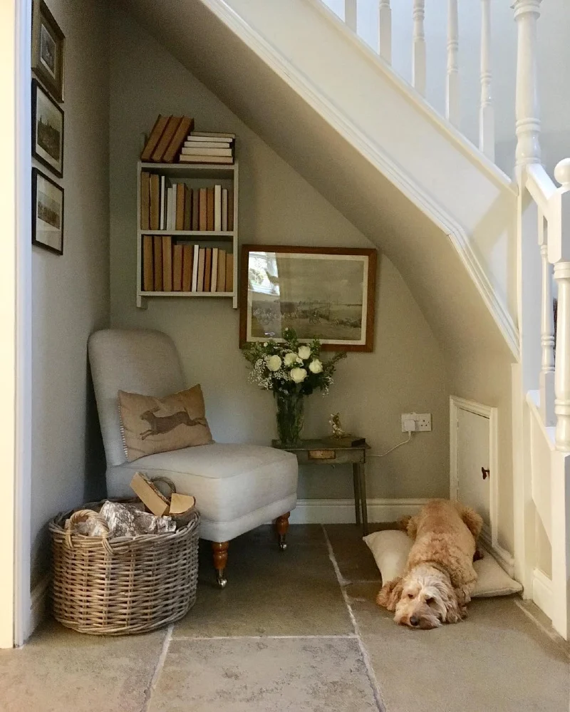 Country-Style Reading Corner with Slipper Chair, Hanging Bookshelf, and Flagstone Flooring