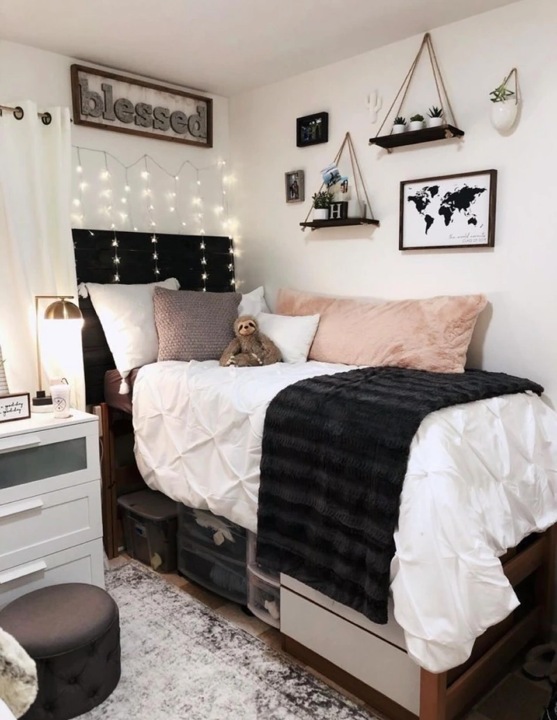 Cozy Neutral Dorm Setup with Fairy Lights and Personal Wall Layers