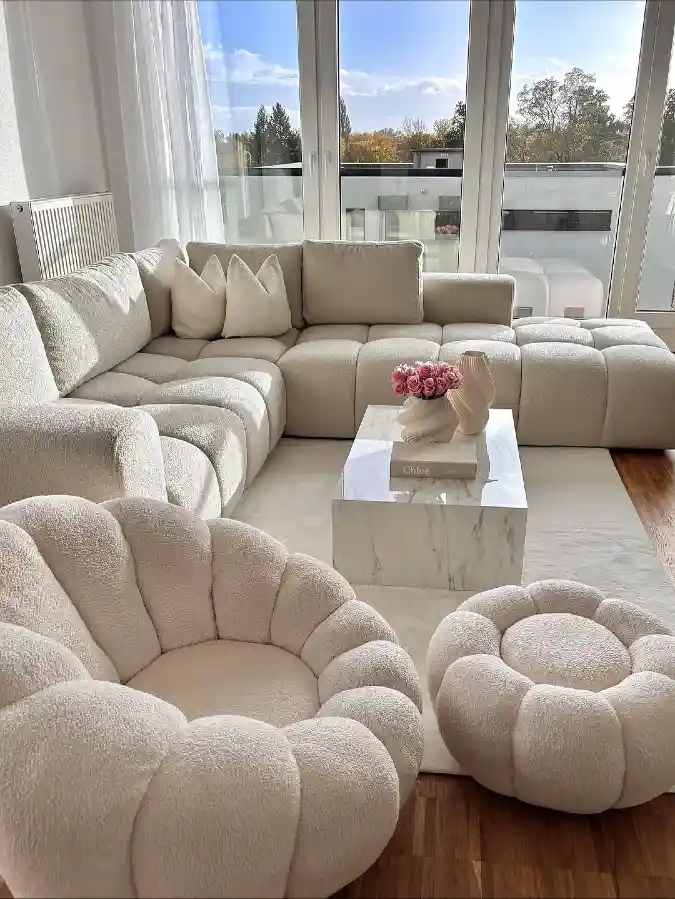 Cream Bouclรฉ Modular Sectional with Pumpkin Accent Chair