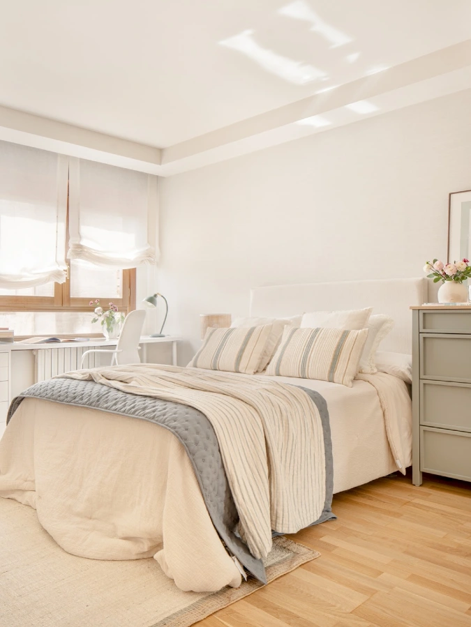 Cream Linen Bed with Window Desk and Soft Striped Pillows