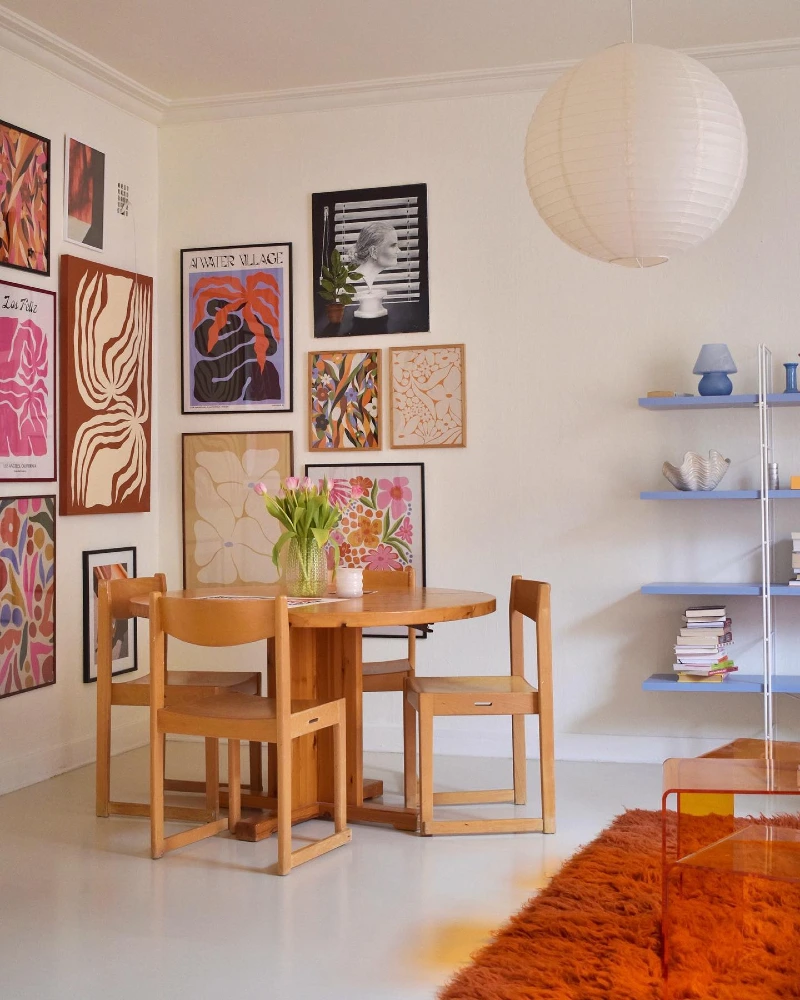 Eclectic Color-Pop Gallery Wall with Mixed Frames and Floating Balance