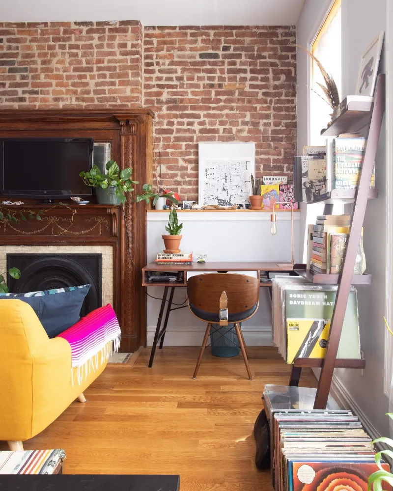 Exposed Brick Wall with Reading Desk and Vinyl Storage Corner