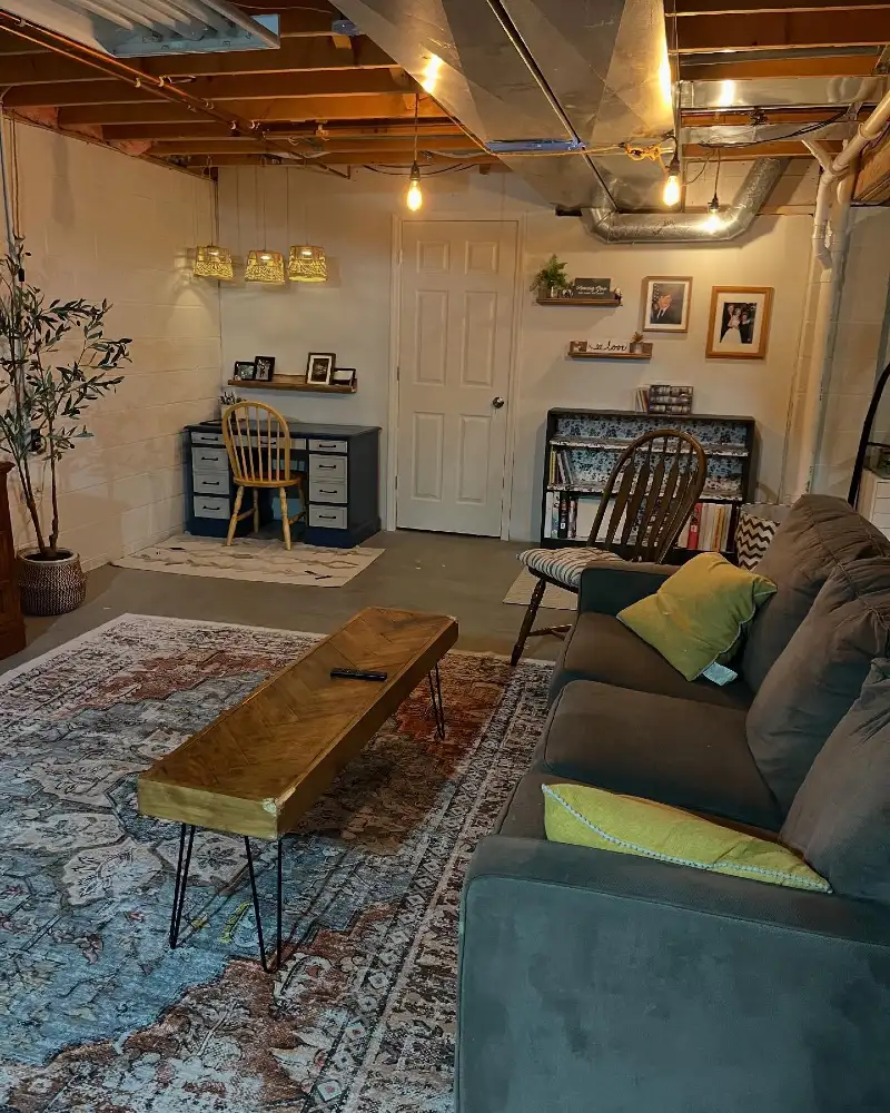 Exposed Unfinished Wooden Joists with Herringbone Hairpin Bench and Vintage Patterned Rug