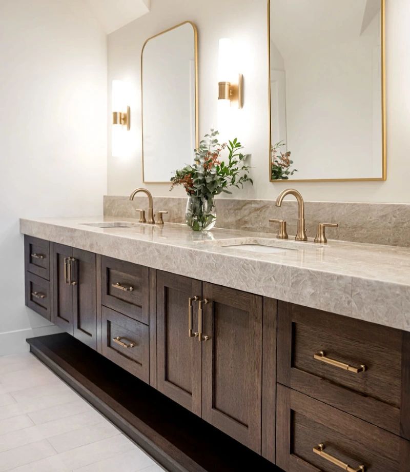 Floating Dark Wood Vanity with Beige Quartzite Countertop and Arched Gold Mirrors