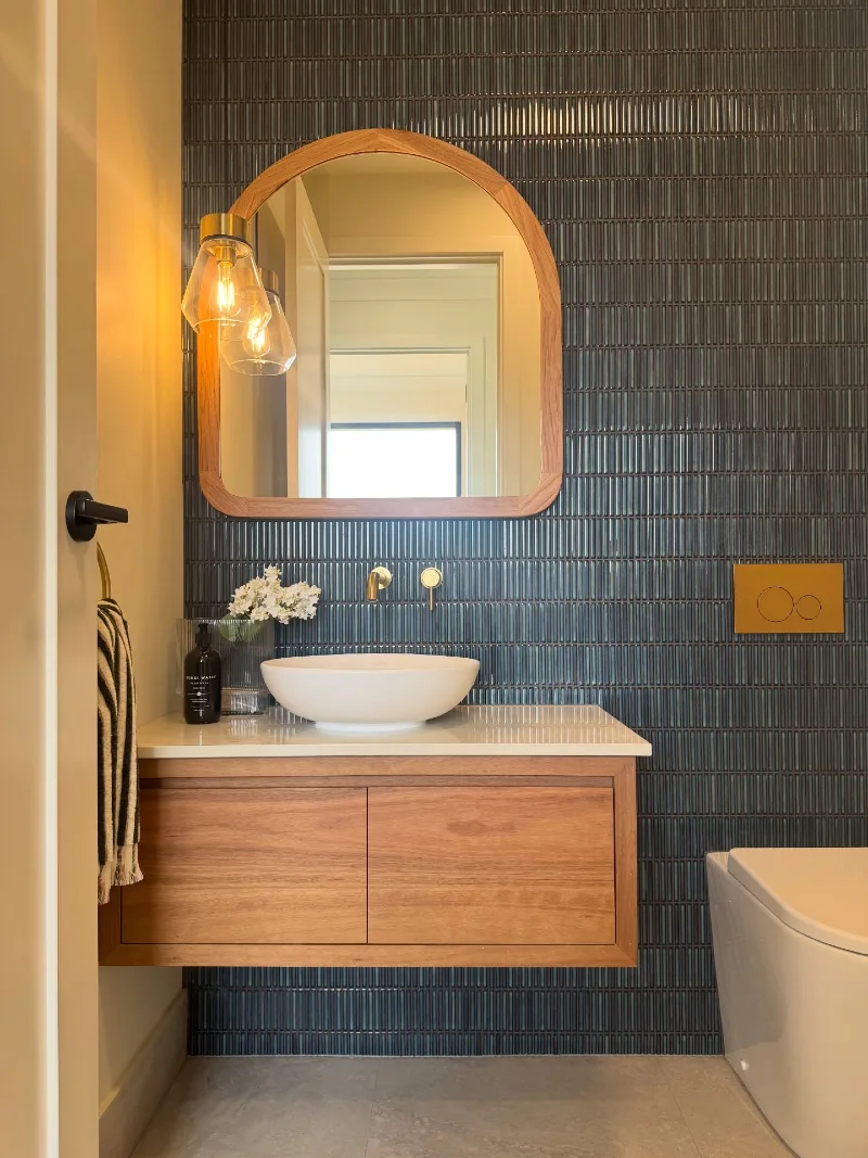 Floating Timber Vanity with Arched Wood Mirror and Slender Kit Kat Feature Tile