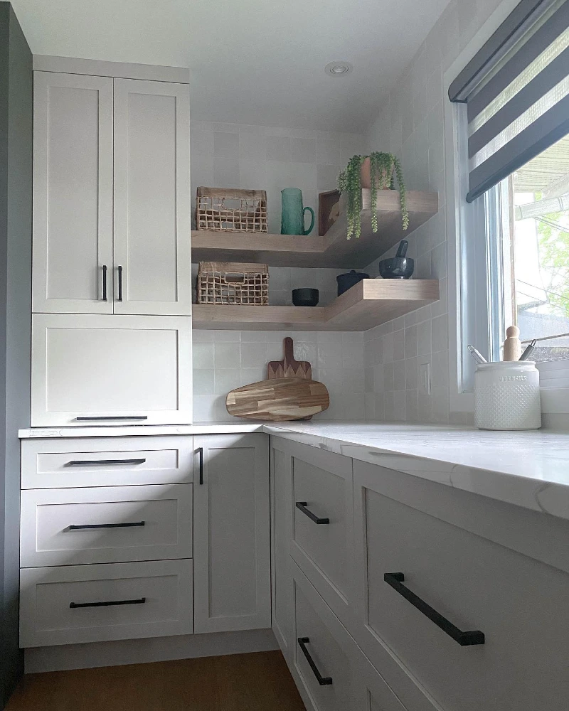 Floating Wood Corner Shelves with Woven Baskets, Cutting Boards, and a Trailing Plant