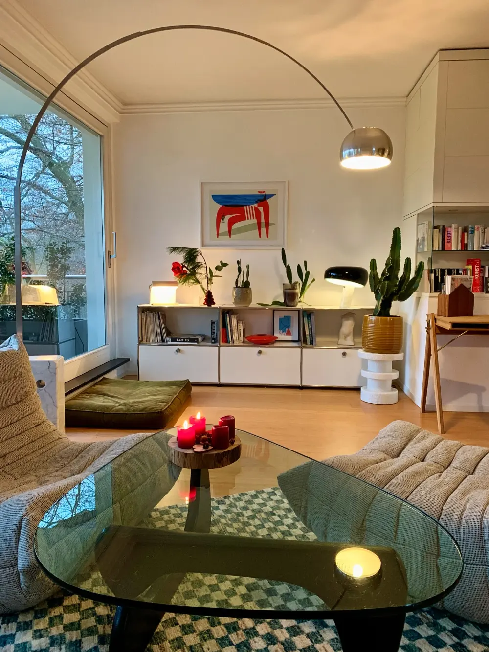 Glass Coffee Table Living Room with Arc Lamp and Warm Shelf Lighting