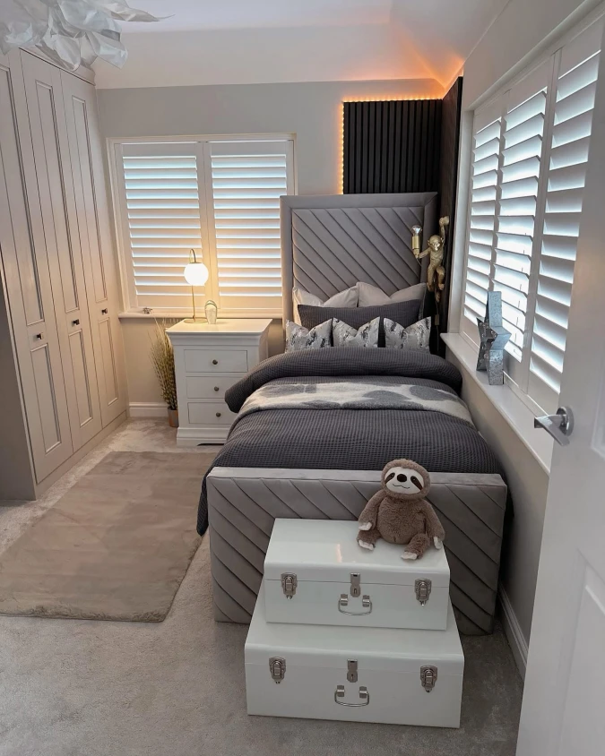 Gray Chevron Bed with Shutters and Stacked Trunks