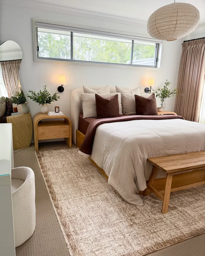 Linen Bed with Paper Lantern and Arched Mirror