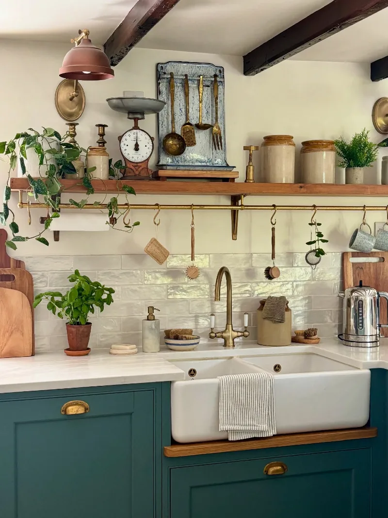 Long Wooden Shelf with Vintage Kitchen Scales, Ceramic Crocks, and an Under-Shelf Brass Hanging Rail