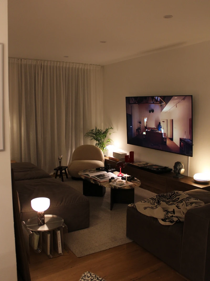 Low-Light Modular Sofa Lounge with Warm Ambient TV Glow
