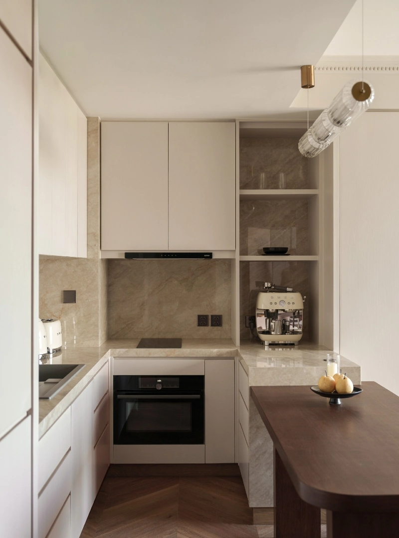 Marble Coffee Niche with Cream Espresso Machine and Soft Beige Cabinets