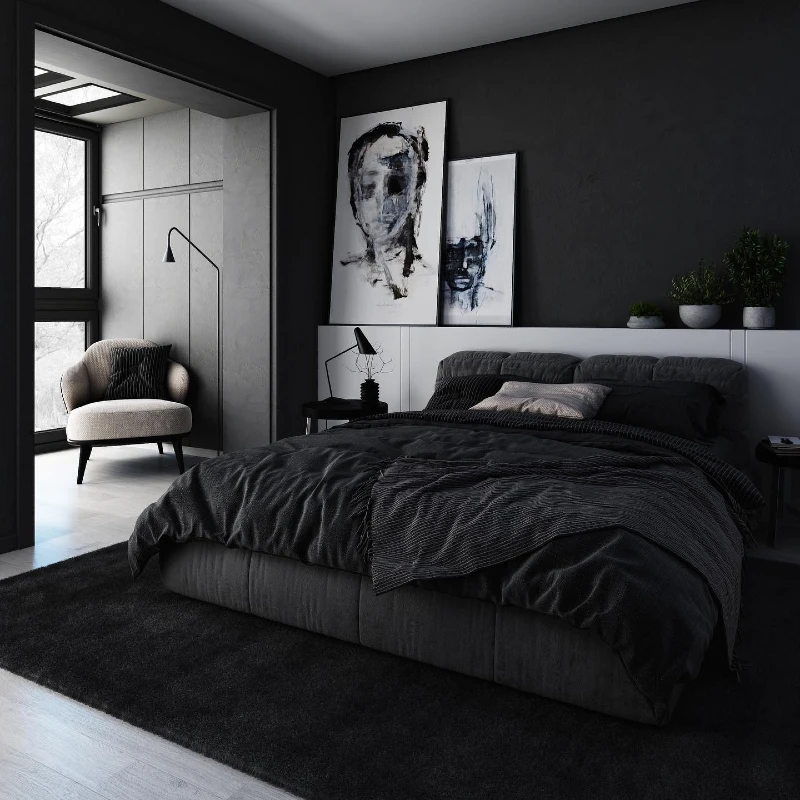 Monochrome Black Bedroom with Abstract Portrait Art and Soft Lounge Corner