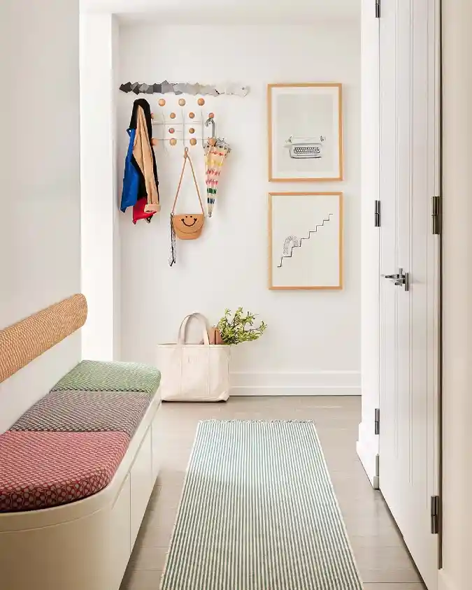 Multi-Hook Coat Rack with a Segmented Cushion Bench